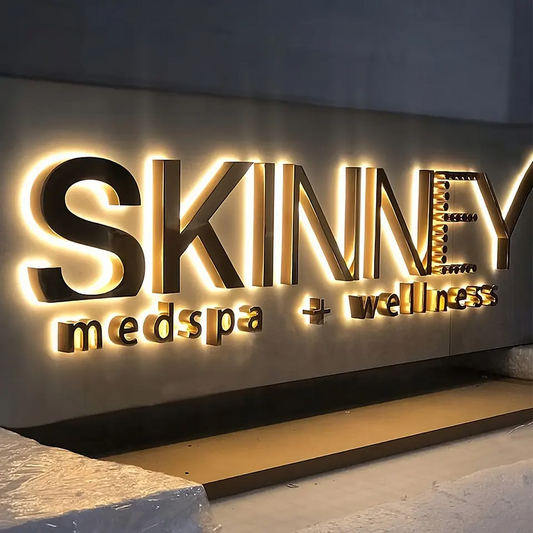 High-visibility back-lit channel letters with sophisticated halo effect for brand enhancement.