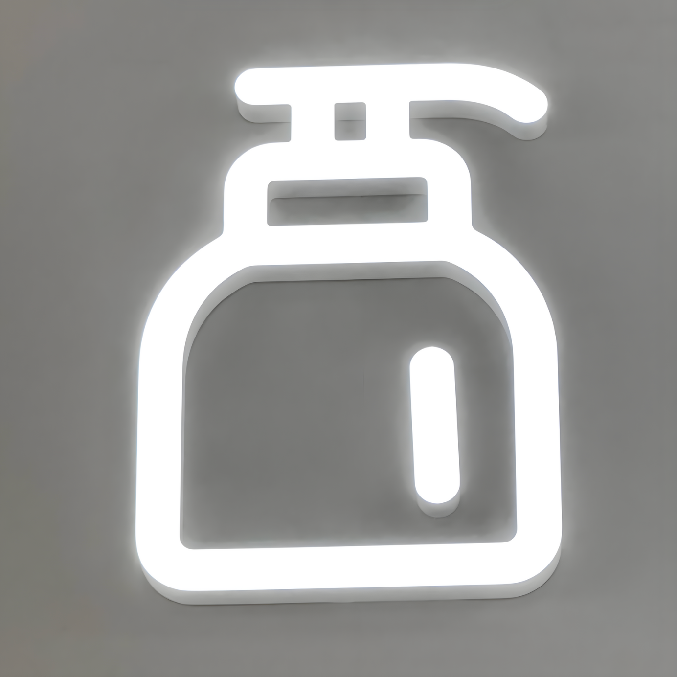 Trimless LED channel letters glowing brightly at night