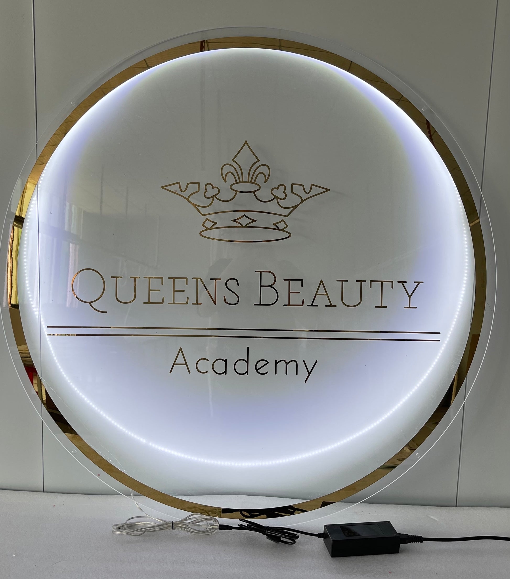 Eye-catching back-lit acrylic plaque for retail stores, enhancing brand visibility