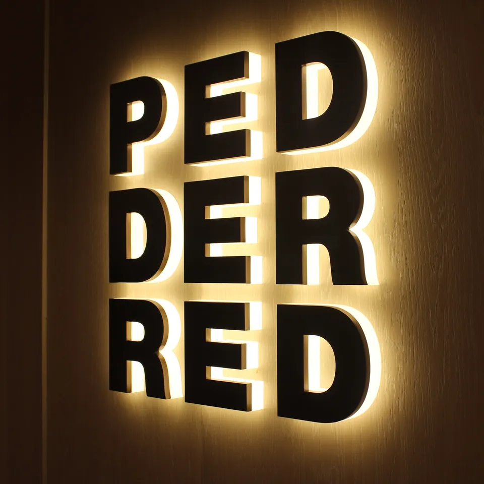 High-quality back-lit channel letters for exterior retail signage.