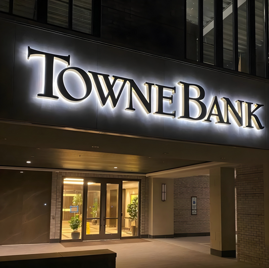 corporate interior branding wall reverse-lit led letters cool white glow