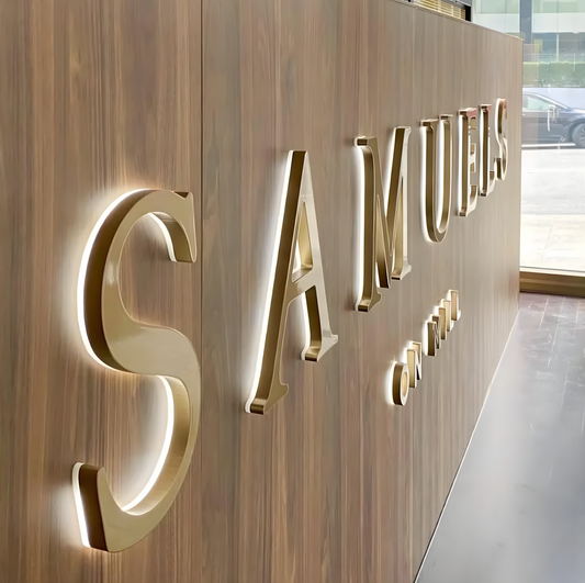 custom business sign halo-lit letters mounted on brick storefront wall