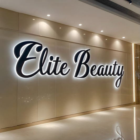 office reception sign stainless halo-lit letters on feature wall