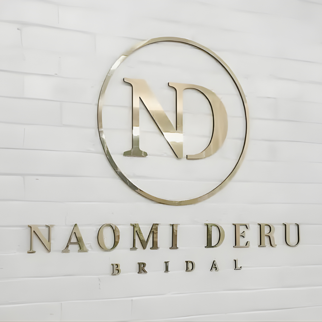 Flat-cut metal sign with precision-cut lettering for storefront branding