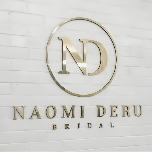 Flat-cut metal sign with precision-cut lettering for storefront branding