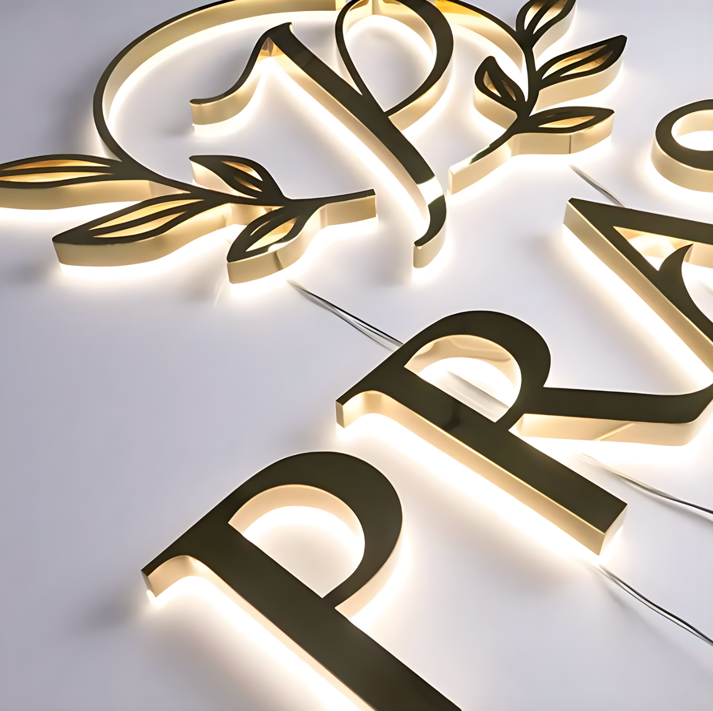 salon and spa interior feature wall with reverse-lit logo letters