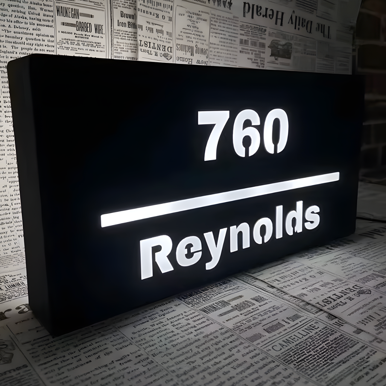 Bold illuminated hollow-out LED feature sign for business branding
