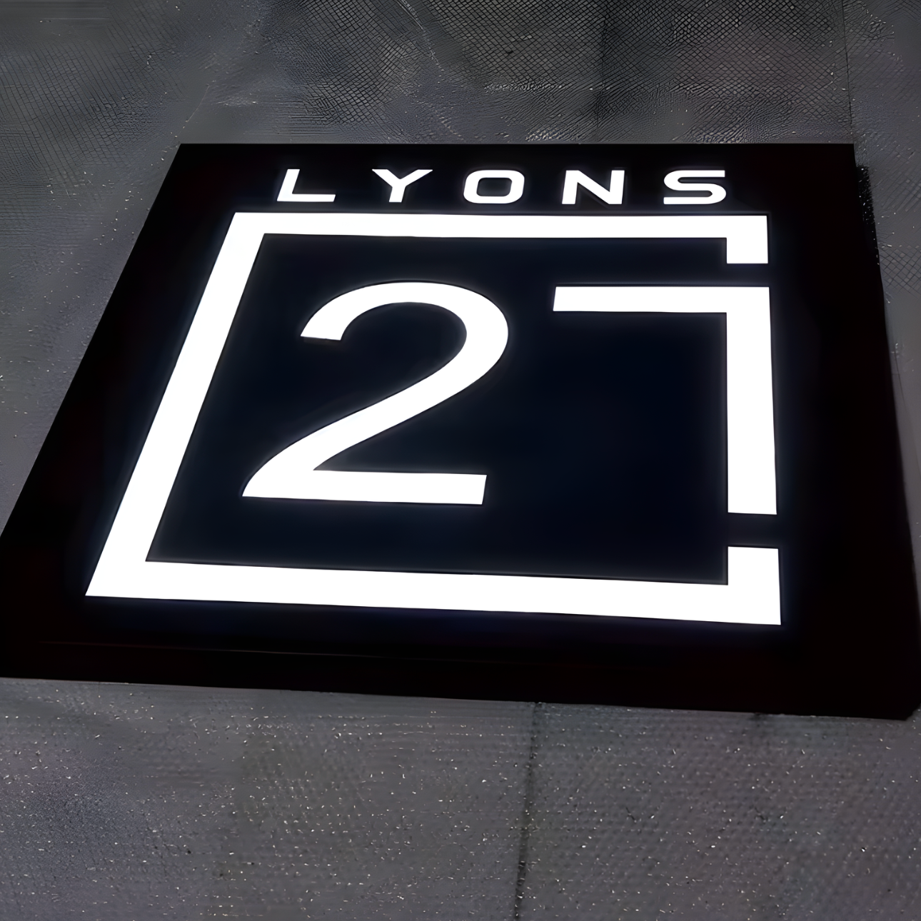 High-visibility hollow-out LED lightbox with clear cut-out lettering