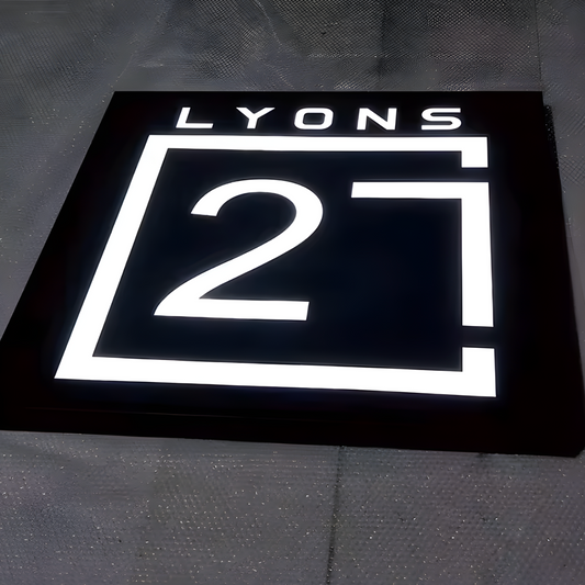 High-visibility hollow-out LED lightbox with clear cut-out lettering