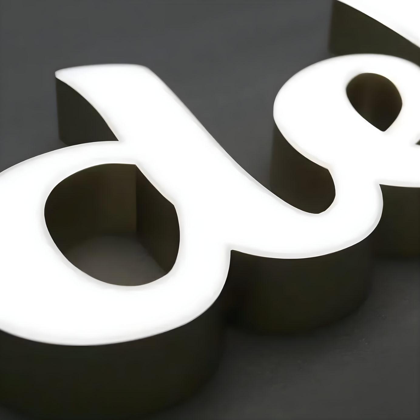 Sleek LED trimless channel letters on modern storefront