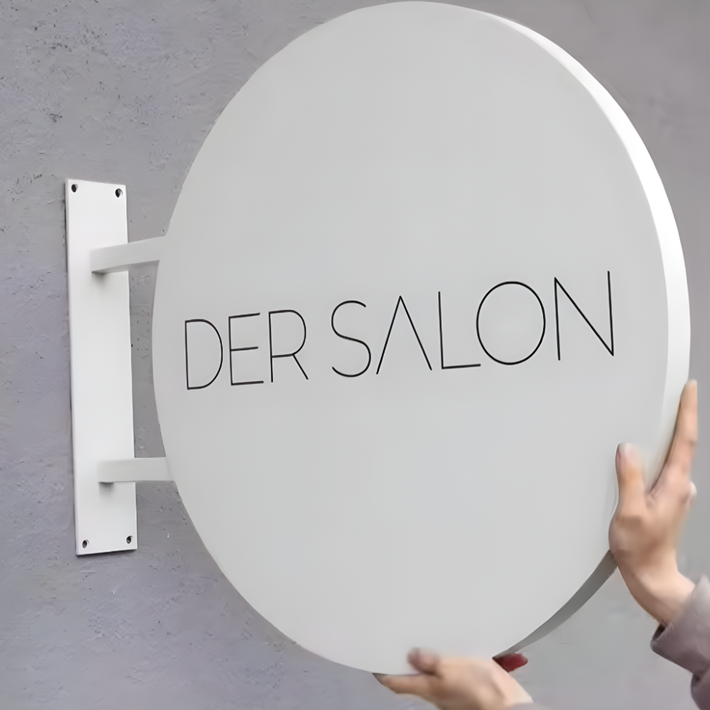 Retail-focused non-illuminated blade sign with clean graphics