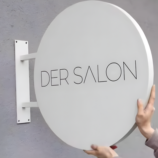 Retail-focused non-illuminated blade sign with clean graphics