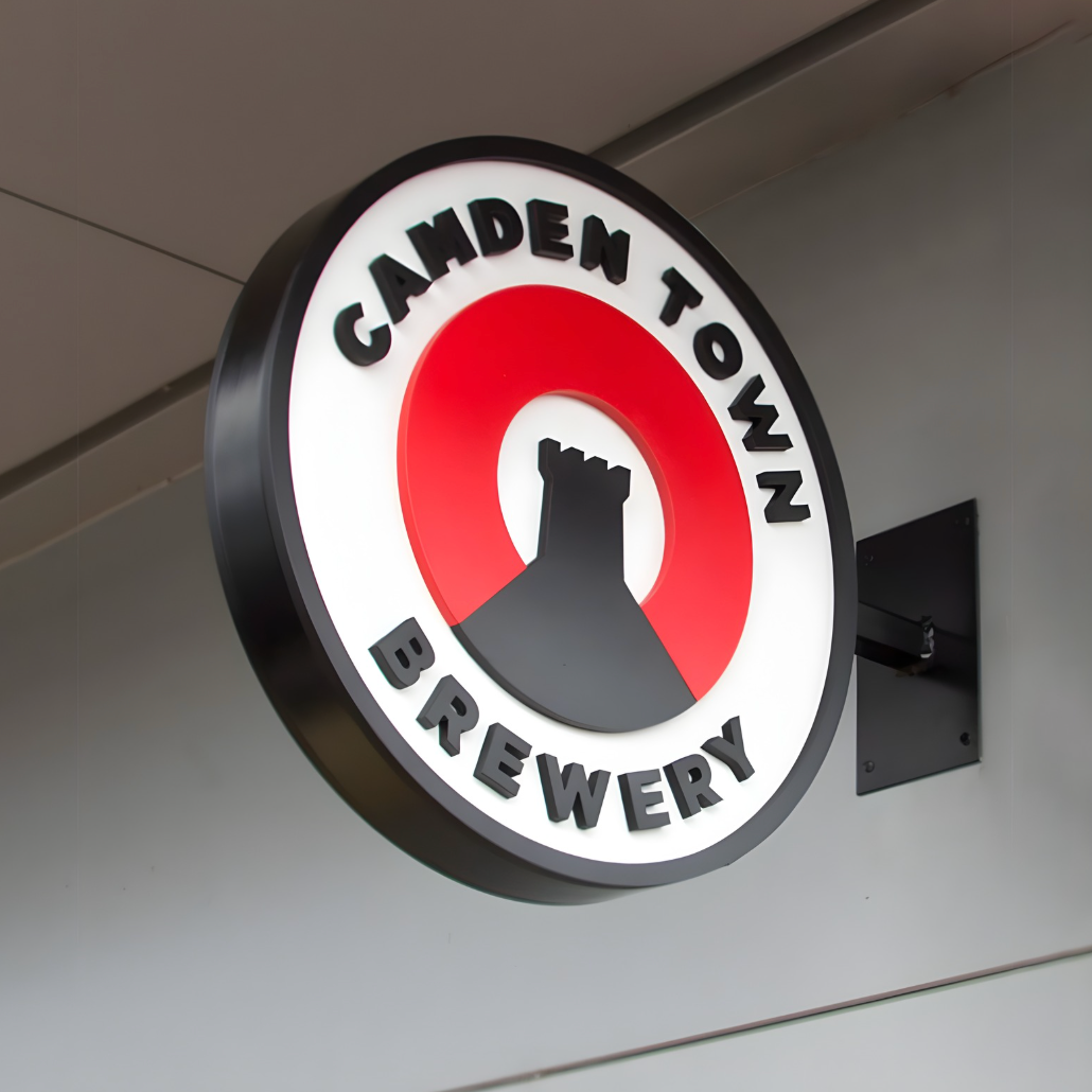 High-visibility non-illuminated blade sign for storefronts