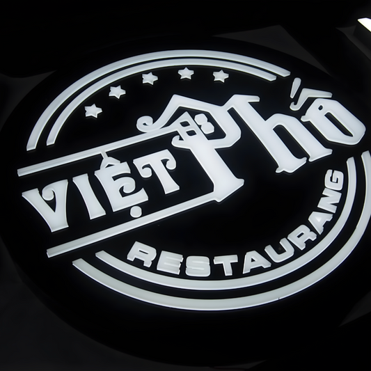 Push-through LED blade sign with raised acrylic elements