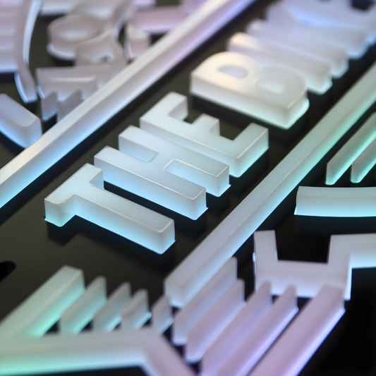 Push-through LED blade sign for high-visibility storefront branding