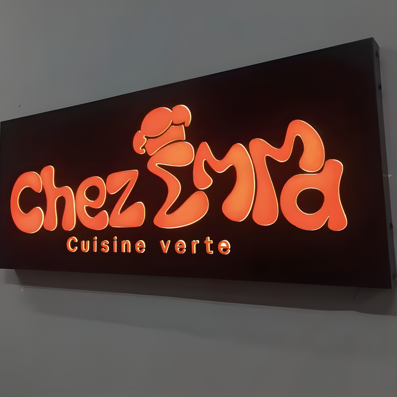 Architectural push-through lightbox with illuminated raised graphics