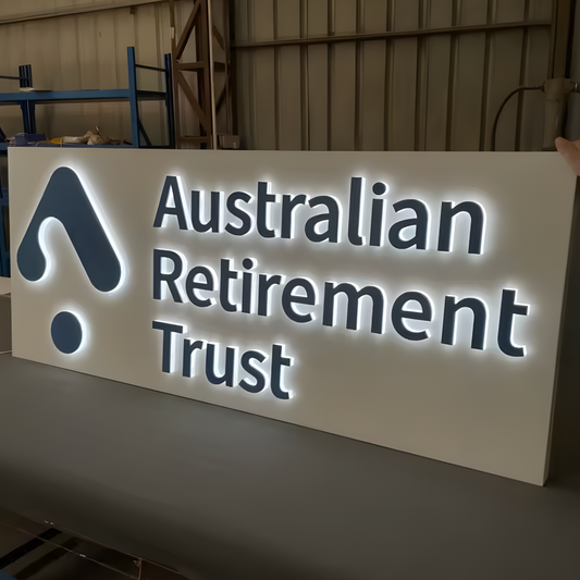 Creative push-through lightbox with lit acrylic logo shapes