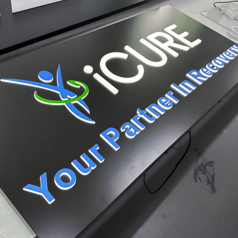 Modern push-through lightbox featuring illuminated 3D acrylic letters