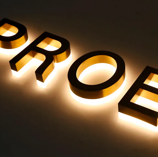 illuminated storefront sign with halo channel letters and shatter-proof acrylic backs