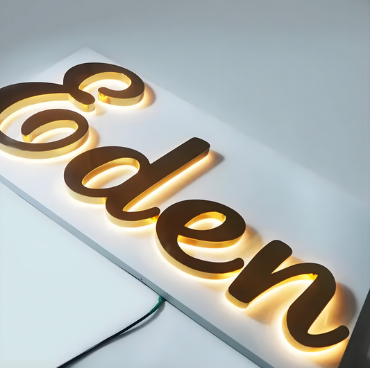 custom business sign halo-lit letters mounted on brick storefront wall