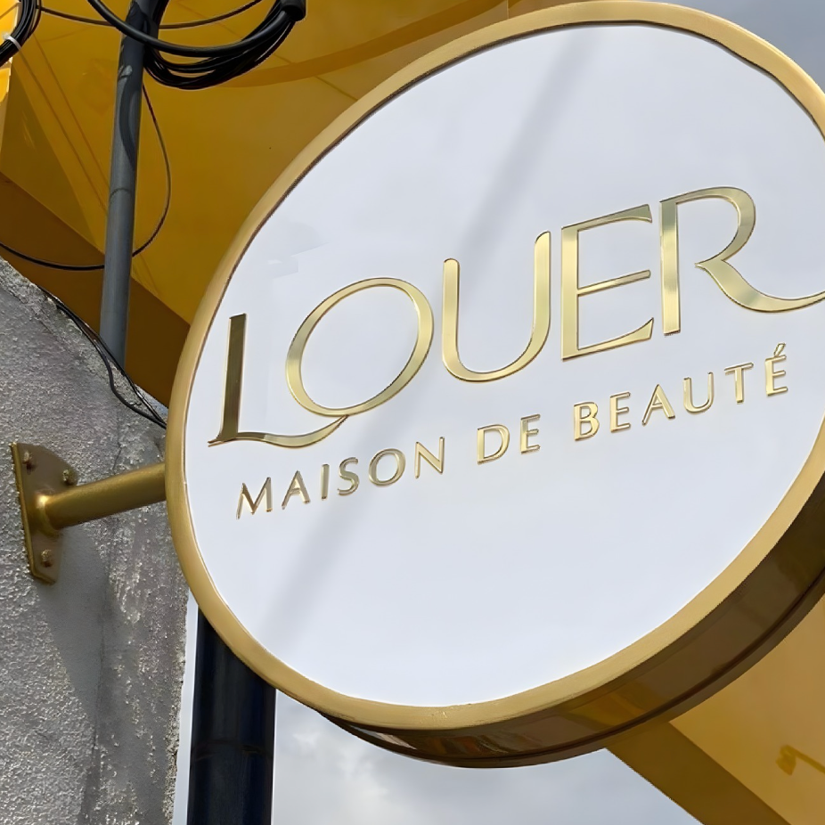 Architectural illuminated trim-cap blade sign with sleek LED design