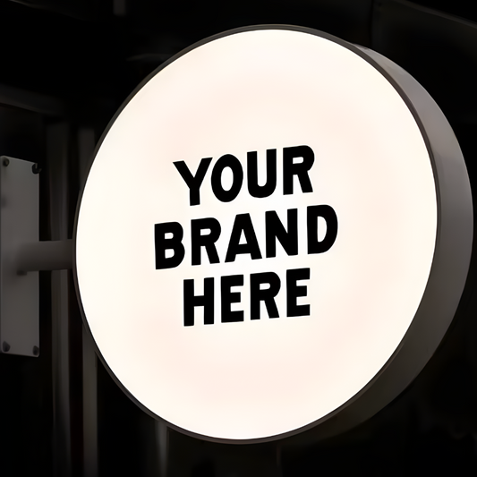 Illuminated trim-cap blade sign with bright LED storefront lighting