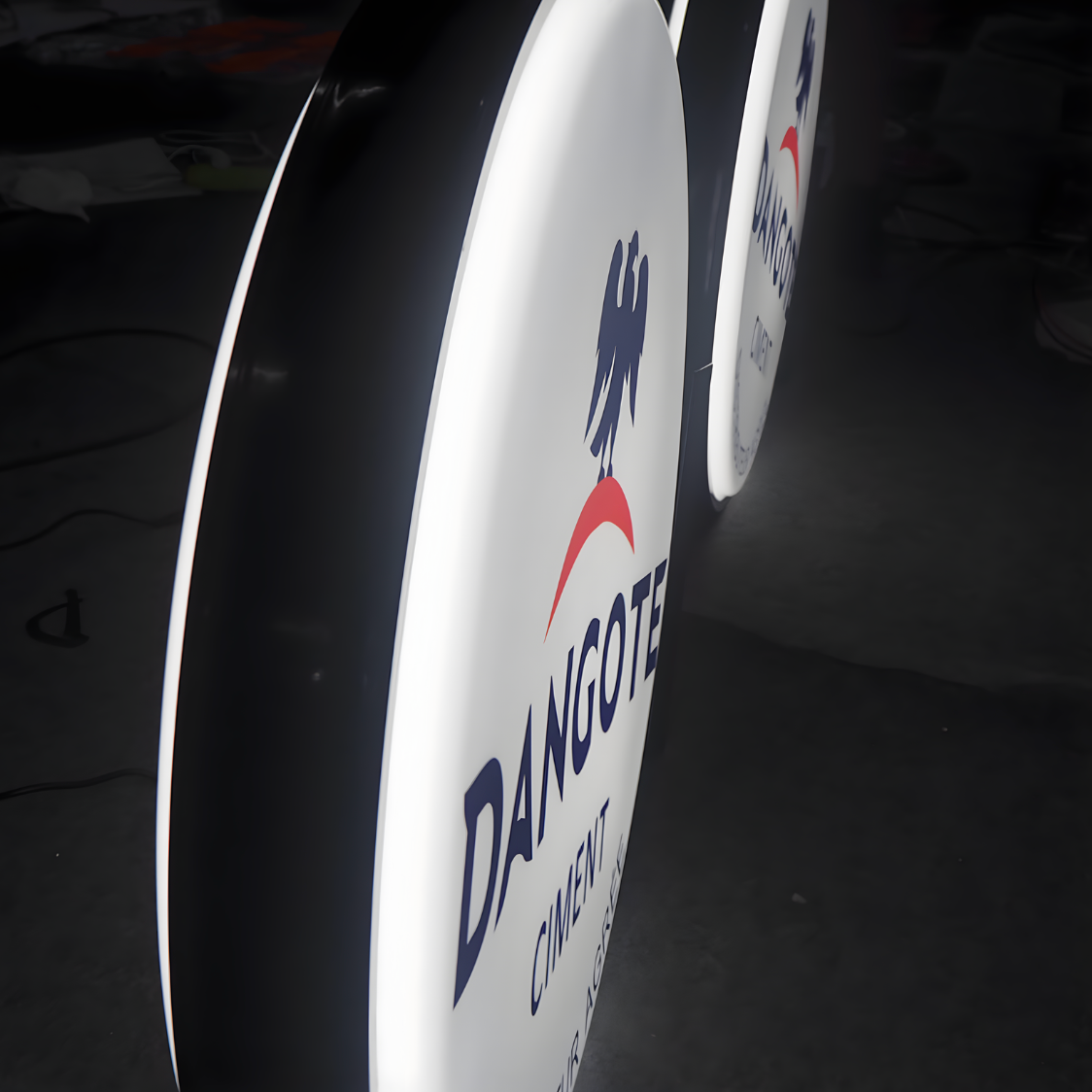 High-visibility vacuum-formed LED blade sign for pedestrians