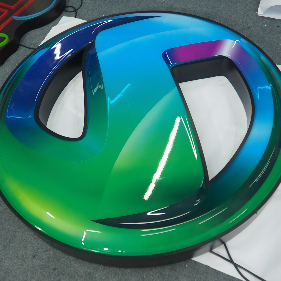 High-contrast vacuum-formed blade sign with bold LED lighting